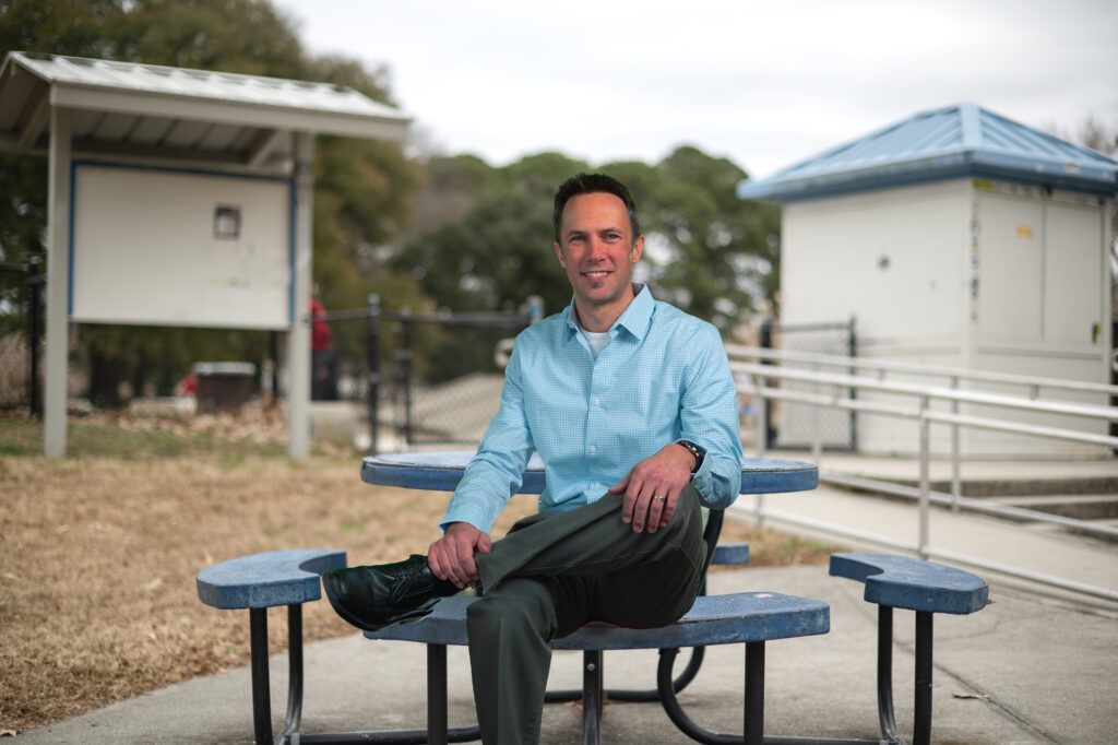 Scott Guirlinger sitting on bench at Northside Skate Park